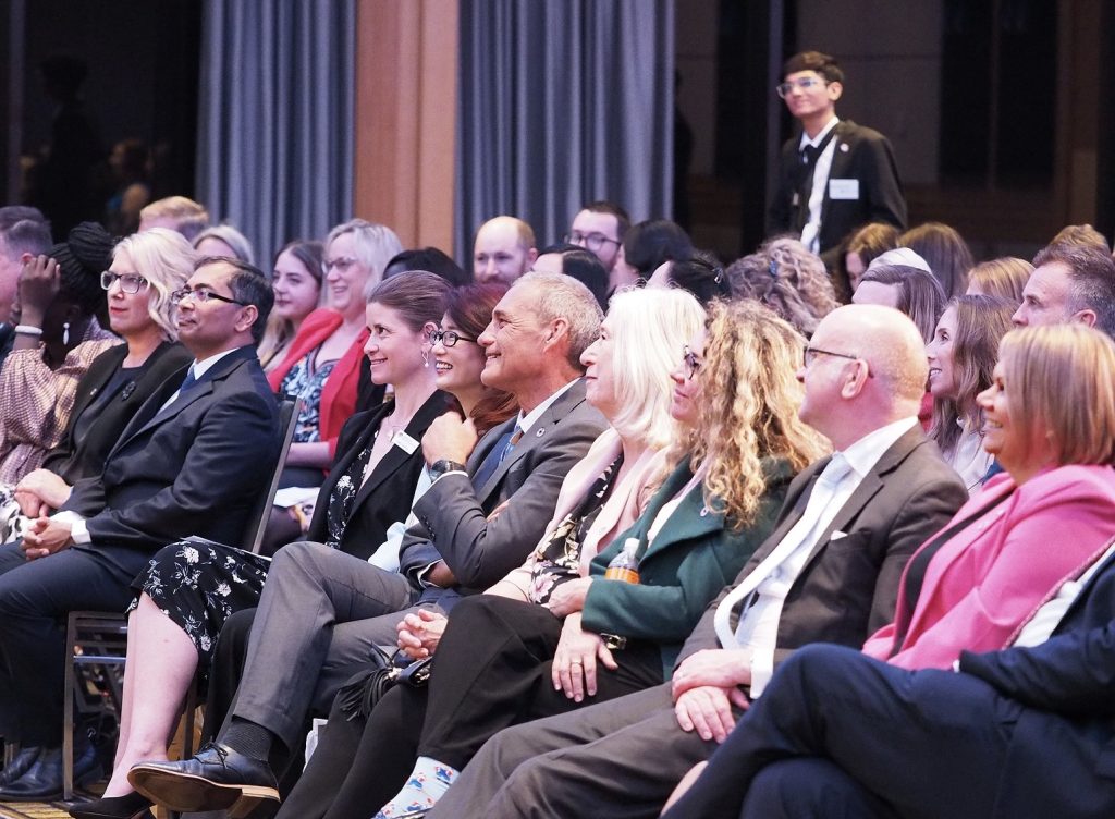 Photo of seated audience