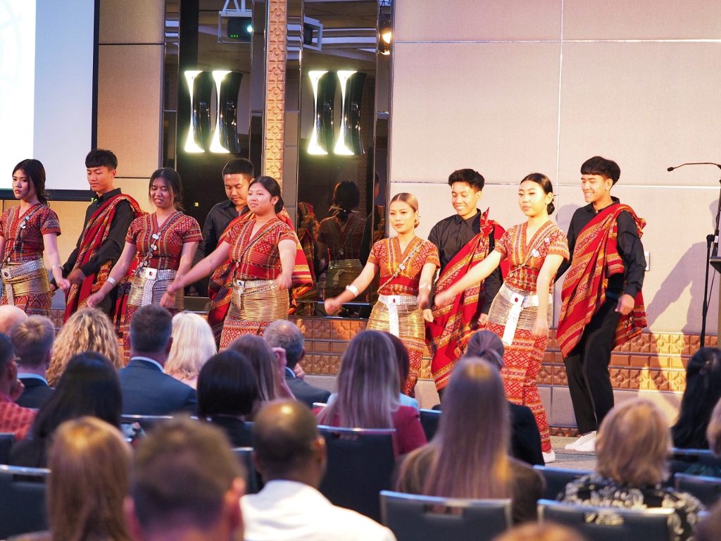 group of dancers on stage