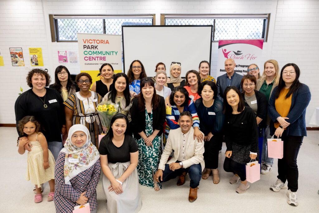 group of multicultural people posing for photo