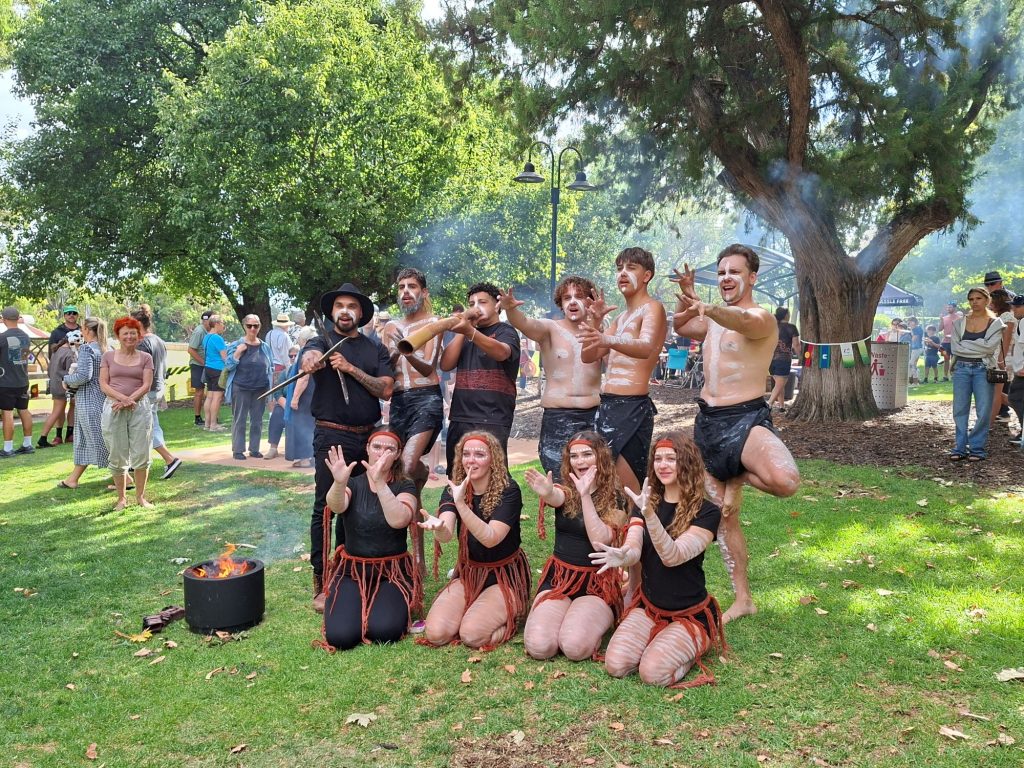 Aboriginal group in traditional dress posing for photo