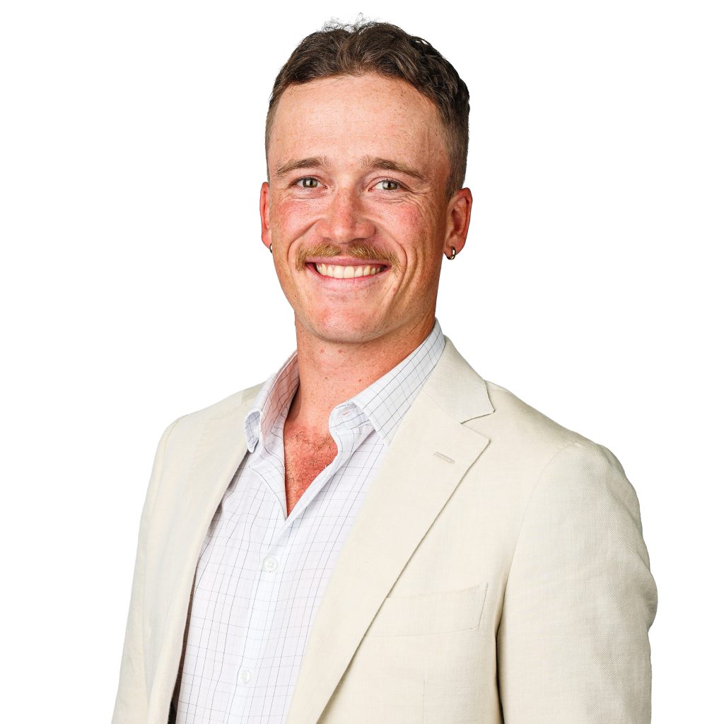 Nedd Brockmann smiling to camera