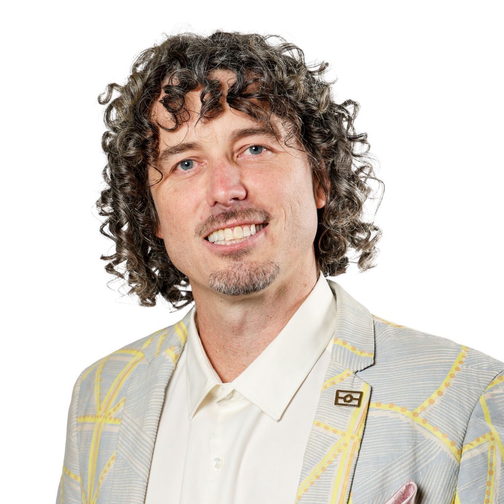 Frank Mitchell smiling to camera